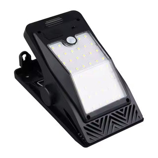 Lampa solara portabila pe clips